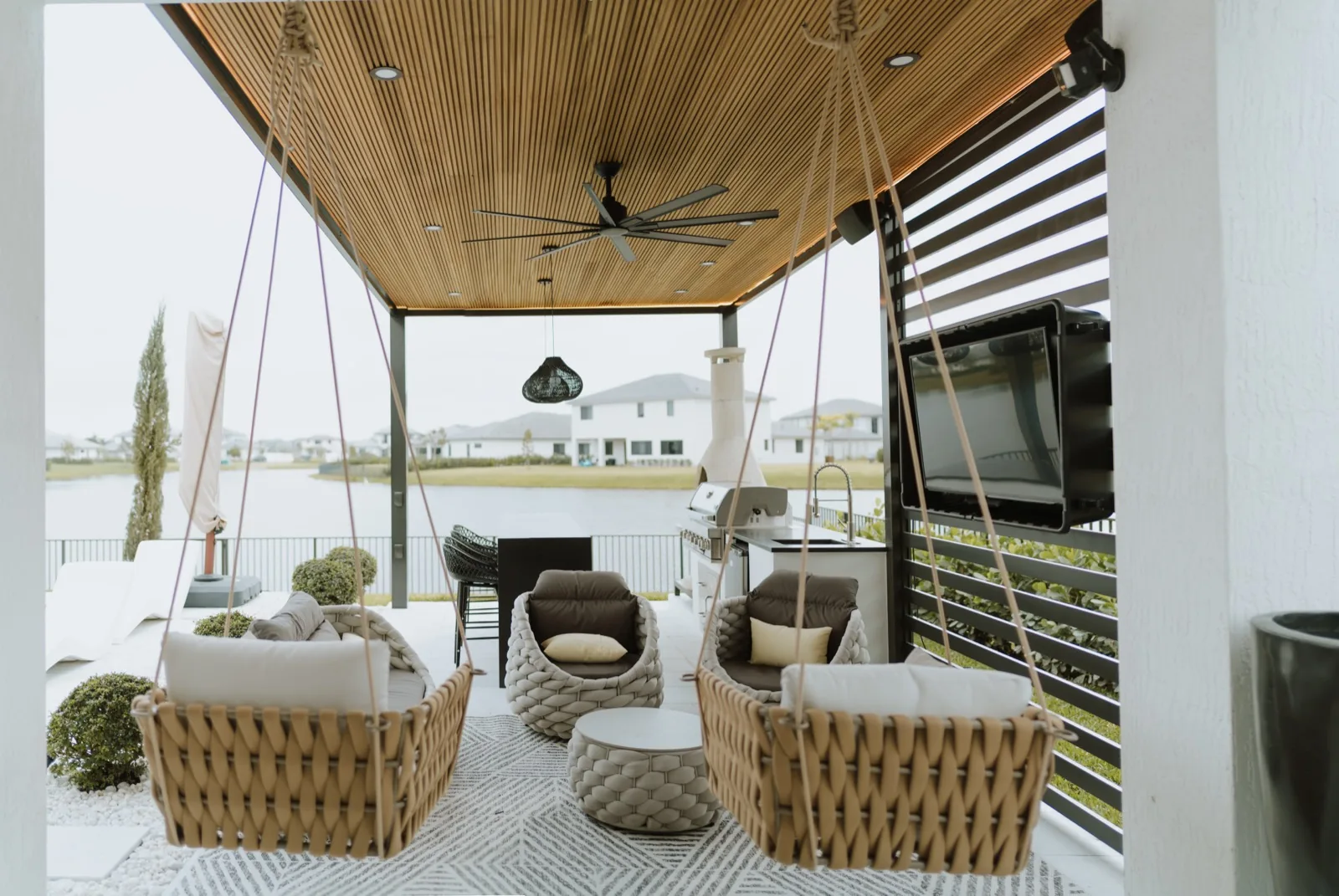 Outdoor living space with modified wood ceiling