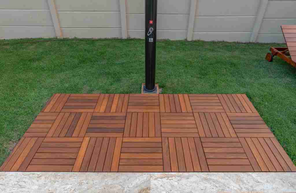 deck tiles over grass