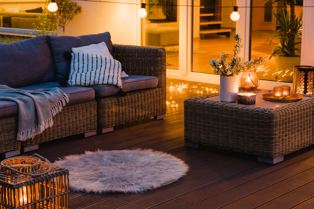 Keep your patio cozy in winter with pillows and blankets