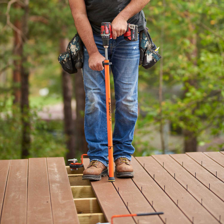 Men using deck fastening tool CAMO Drive