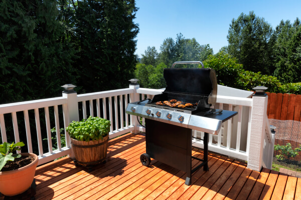 Small outdoor deck with a grill