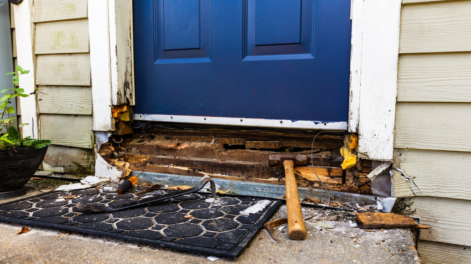 Rotten Timber in a blue door