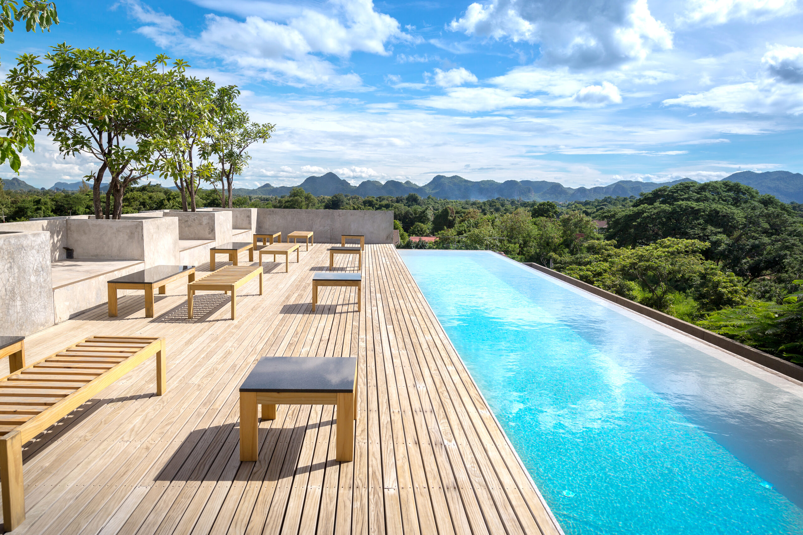 Swimming pool on top of roof deck building